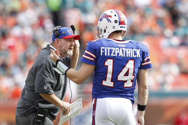 MIAMI GARDENS, FL - DECEMBER 23: Head coach Chan Gailey talks to Ryan Fitzpatrick #14 of the Buffalo Bills during a time out against the Miami Dolphins on December 23, 2012 at Sun Life Stadium in Miami Gardens, Florida. (Photo by Joel Auerbach/Getty Images)