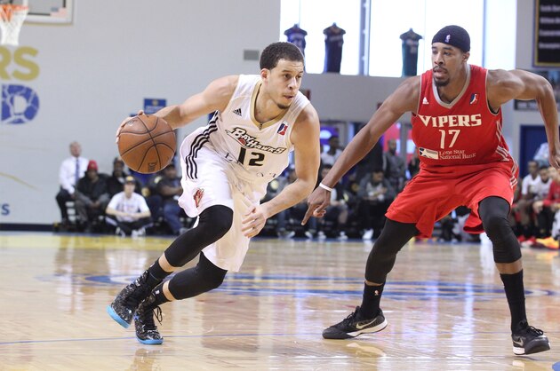 SANTA CRUZ - JANUARY 16: Seth Curry #12 of the Erie Bayhawks dribbles the ball against the Rio Grande Valley Vipers during the 2015 NBA D-League Showcase presented by SAMSUNG on January 16, 2015 at Kaiser Permanente Arena in Santa Cruz, California. NOTE TO USER: User expressly acknowledges and agrees that, by downloading and/or using this Photograph, user is consenting to the terms and conditions of the Getty Images License Agreement. Mandatory Copyright Notice: Copyright 2015 NBAE (Photo by Jack Arent/NBAE via Getty Images)