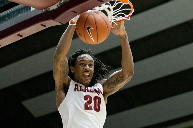Feb 22, 2014; Tuscaloosa, AL, USA; Alabama Crimson Tide guard Levi Randolph (20) dunks the ball against the Missouri Tigers at Coleman Coliseum. The Crimson Tide defeated the Tigers 80-73. Mandatory Credit: Marvin Gentry-USA TODAY Sports