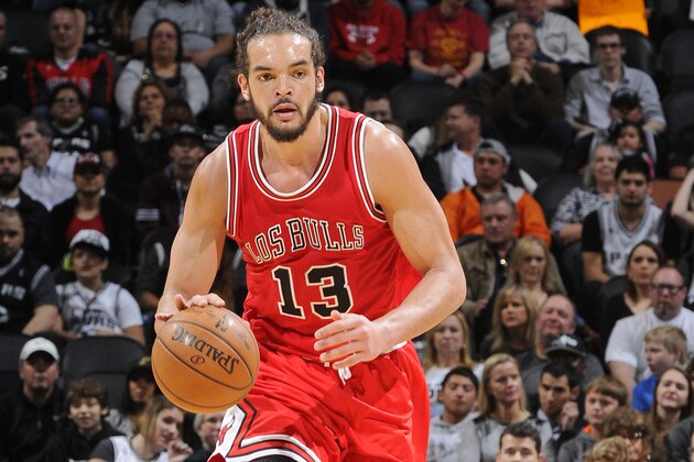 SAN ANTONIO, TX - MARCH 8: Joakim Noah #13 of the Chicago Bulls drives to the basket against the San Antonio Spurs during the game on March 8, 2015 at AT&T Center in San Antonio, Texas. NOTE TO USER: User expressly acknowledges and agrees that, by downloading and/or using this photograph, User is consenting to the terms and conditions of the Getty Images License Agreement. Mandatory Copyright Notice: Copyright 2015 NBAE (Photo by D. Clarke Evans/NBAE via Getty Images)
