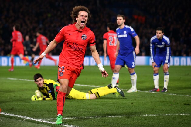 LONDON, ENGLAND - MARCH 11: David Luiz of PSG celebrates after teammate Thiago Silva of PSG scores a goal to level the scores at 2-2 during the UEFA Champions League Round of 16, second leg match between Chelsea and Paris Saint-Germain at Stamford Bridge on March 11, 2015 in London, England. (Photo by Paul Gilham/Getty Images) LONDON, ENGLAND - MARCH 11: David Luiz of PSG celebrates after teammate Thiago Silva of PSG scores a goal to level the scores at 2-2 during the UEFA Champions League Round of 16, second leg match between Chelsea and Paris Saint-Germain at Stamford Bridge on March 11, 2015 in London, England. (Photo by Paul Gilham/Getty Images)