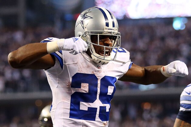 ARLINGTON, TX - JANUARY 04:  DeMarco Murray #29 of the Dallas Cowboys celebrates after running for a touchdown against the Detroit Lions during the second half of their NFC Wild Card Playoff game at AT&T Stadium on January 4, 2015 in Arlington, Texas.  (Photo by Ronald Martinez/Getty Images)
