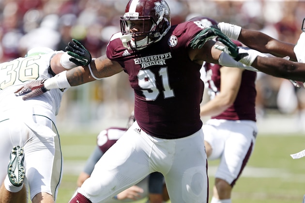 Mississippi State defensive lineman Preston Smith (91) readies for a tackle against UAB in the second half of an NCAA college football game at Davis Wade Stadium in Starkville, Miss., Saturday, Sept. 6, 2014. Mississippi State won 47-34. (AP Photo/Rogelio V. Solis)