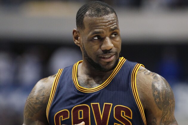 Cleveland Cavaliers forward LeBron James (23) looks on during the second half of an NBA basketball game against the Dallas Mavericks, Tuesday, March 10, 2015, in Dallas. Cleveland won 127-94. (AP Photo/Brandon Wade)