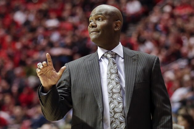 Nevada coach David Carter gestures as Nevada plays San Diego State during the second half of an NCAA college basketball game Saturday, March 7, 2015, in San Diego. San Diego State won 67-43. (AP Photo/Gregory Bull)