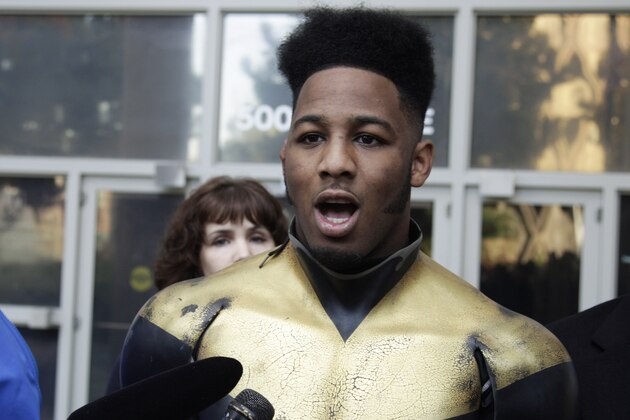 FILE - In this Oct. 13, 2011 file photo, Benjamin Fodor, a self-styled superhero who goes by the name