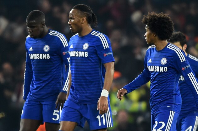 LONDON, ENGLAND - MARCH 11:  Dejected Chelsea players look on during the UEFA Champions League Round of 16, second leg match between Chelsea and Paris Saint-Germain at Stamford Bridge on March 11, 2015 in London, England.  (Photo by Mike Hewitt/Getty Images)