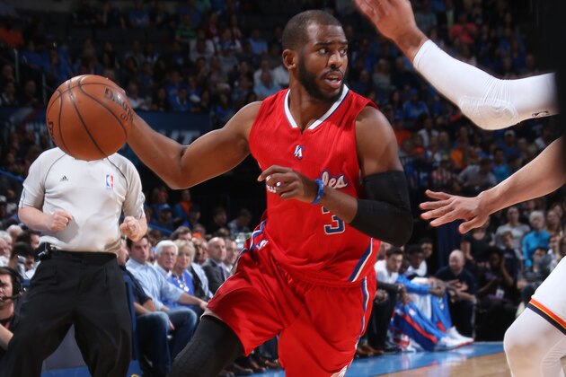 OKLAHOMA CITY, OK - MARCH 11: Chris Paul #3 of the Los Angeles Clippers handles the ball against the Oklahoma City Thunder on March 11, 2015 at the Chesapeake Energy Arena in Oklahoma City, Oklahoma. NOTE TO USER: User expressly acknowledges and agrees that, by downloading and or using this Photograph, user is consenting to the terms and conditions of the Getty Images License Agreement. Mandatory Copyright Notice: Copyright 2015 NBAE (Photo by Layne Murdoch Jr./NBAE via Getty Images)