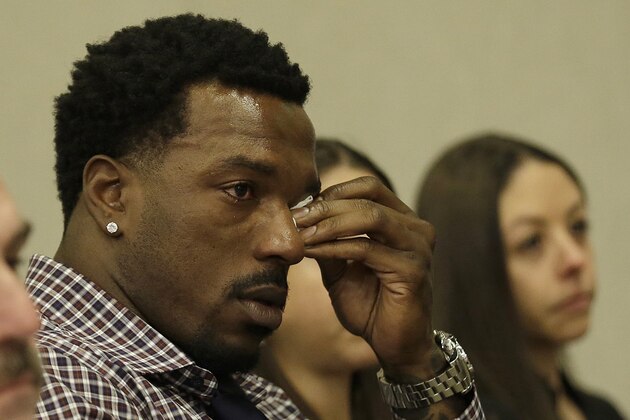 San Francisco 49ers linebacker Patrick Willis wipes his eyes as he listens to speakers at a news conference at the 49ers' NFL football facility in Santa Clara, Tuesday, March 10, 2015. Willis, a seven-time Pro Bowler, will retire after his 2014 season was cut short by a toe injury that required surgery, the 49ers announced, Tuesday. (AP Photo/Jeff Chiu)