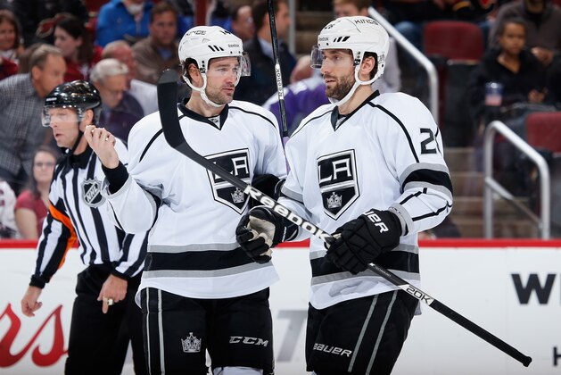 GLENDALE, AZ - DECEMBER 04:  Justin Williams #14 and Jarret Stoll #28 of the Los Angeles Kings talk during the NHL game against the Arizona Coyotes at Gila River Arena on December 4, 2014 in Glendale, Arizona. The Kings defeated the Coyotes 4-0.  (Photo by Christian Petersen/Getty Images)