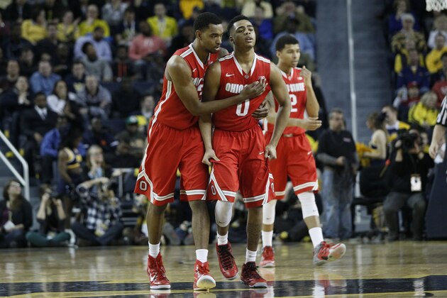 ANN ARBOR, MI - FEBRUARY 22:  D'Angelo Russell #0 of the Ohio State Buckeyes is consoled by Keita Bates-Diop #33 of the Ohio State Buckeyes after turning over the ball during the second half of a game against the Michigan Wolverines at Crisler Arena on February 22, 2015 in Ann Arbor, Michigan. Michigan defeated Ohio State 64-57. (Photo by Duane Burleson/Getty Images)
