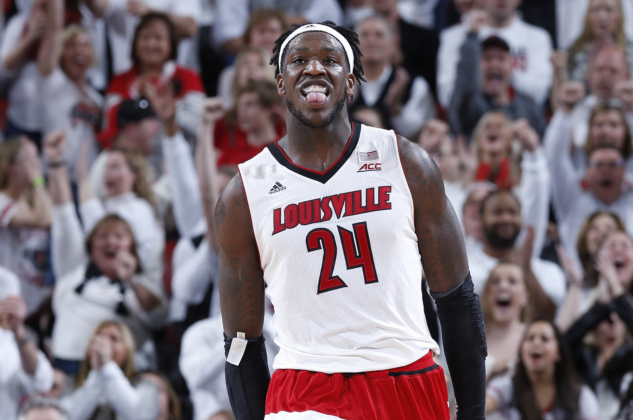LOUISVILLE, KY - JANUARY 31: Montrezl Harrell #24 of the Louisville Cardinals reacts after making a basket and drawing a foul against the North Carolina Tar Heels during the game at KFC Yum! Center on January 31, 2015 in Louisville, Kentucky. Louisville defeated North Carolina 78-68 in overtime. (Photo by Joe Robbins/Getty Images)