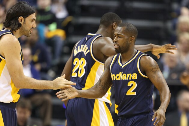 Mar 10, 2015; Indianapolis, IN, USA; Indiana Pacers guard Rodney Stuckey (2) after scoring and getting fouled is congratulated by forward Luis Scola (4) during a game against the Orlando Magic at Bankers Life Fieldhouse. Mandatory Credit: Brian Spurlock-USA TODAY Sports