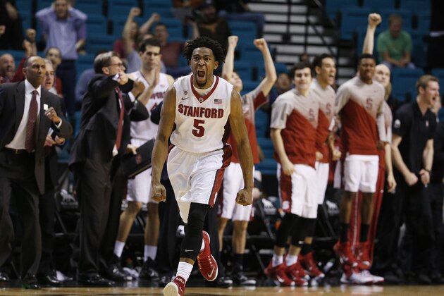 Stanford's Chasson Randle celebrates after sinking a game winning basket to defeat Washington in an NCAA college basketball game in the first round of the Pac-12 conference tournament Wednesday, March 11, 2015, in Las Vegas. Stanford won 71-69. (AP Photo/John Locher)