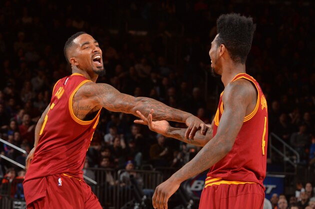 NEW YORK, NY - FEBRUARY 22:  J.R. Smith #5 and Iman Shumpert #4 of the Cleveland Cavilers share a moment after J.R. Smiths's reverse dunk against the New York Knicks on February 22, 2015 at Madison Square Garden in New York City.  NOTE TO USER: User expressly acknowledges and agrees that, by downloading and or using this Photograph, user is consenting to the terms and conditions of the Getty Images License Agreement. Mandatory Copyright Notice: Copyright 2015 NBAE (Photo by Jesse D. Garrabrant/NBAE via Getty Images)