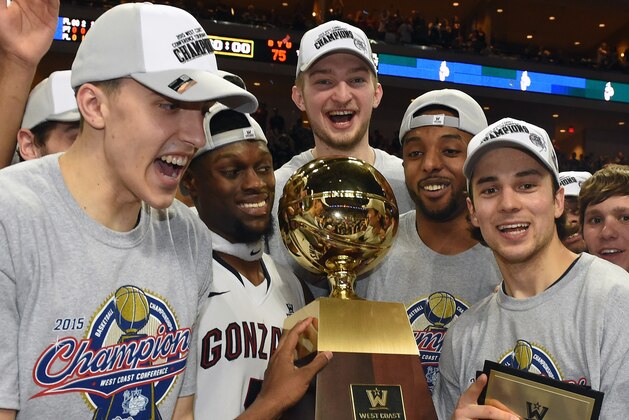 LAS VEGAS, NV - MARCH 10:   (L-R) Kyle Wiltjer #33, Gary Bell Jr. #5, Domantas Sabonis #11, Byron Wesley #22 and Kevin Pangos #4 of the Gonzaga Bulldogs celebrate with the trophy after defeating the Brigham Young Cougars 91-75 to win the championship game of the West Coast Conference Basketball tournament at the Orleans Arena on March 10, 2015 in Las Vegas, Nevada.  (Photo by Ethan Miller/Getty Images)