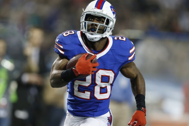 Buffalo Bills running back C.J. Spiller (28) runs for a touchdown against the Atlanta Falcons during the second half of an NFL football game on Sunday, Dec. 1, 2013, in Toronto. (AP Photo/Gary Wiepert)