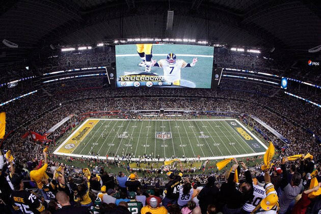 ARLINGTON, TX - FEBRUARY 06:  Quarterback Ben Roethlisberger #7 of the Pittsburgh Steelers is seen on the screen after the Steelers score a touchdown in the second half while taking on the Green Bay Packers during Super Bowl XLV at Cowboys Stadium on February 6, 2011 in Arlington, Texas.  (Photo by Tom Pennington/Getty Images)