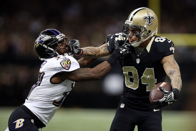 NEW ORLEANS, LA - NOVEMBER 24:  Kenny Stills #84 of the New Orleans Saints is pursued by Danny Gorrer #37 of the Baltimore Ravens during the fourth quarter of a game at the Mercedes-Benz Superdome on November 24, 2014 in New Orleans, Louisiana.  (Photo by Chris Graythen/Getty Images)