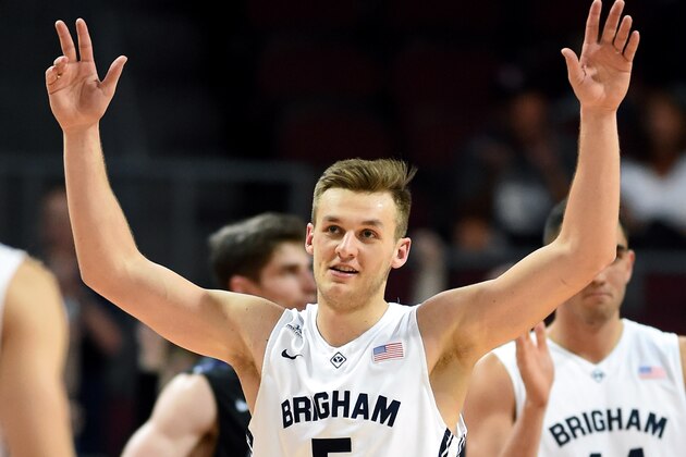 LAS VEGAS, NV - MARCH 09:  Kyle Collinsworth #5 of the Brigham Young Cougars reacts after tying the NCAA career record for triple-doubles with six, all coming this season, during a semifinal game of the West Coast Conference Basketball tournament at the Orleans Arena on March 9, 2015 in Las Vegas, Nevada. Brigham Young won 84-70.  (Photo by Ethan Miller/Getty Images)
