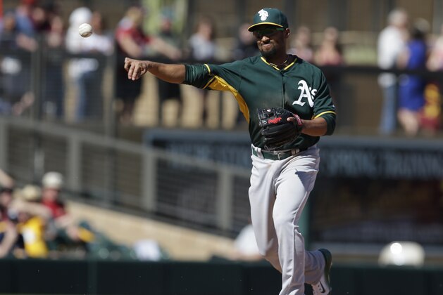 Oakland Athletics' Marcus Semien in action during a spring training baseball game against the Arizona Diamondbacks, Friday, March 6, 2015, in Scottsdale, Ariz. (AP Photo/Darron Cummings)