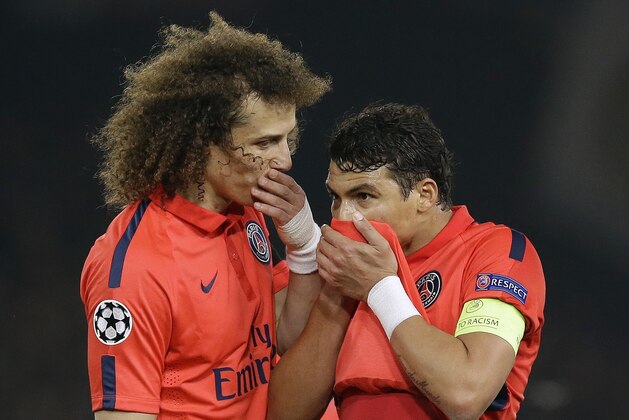 PSG's David Luiz, left, talks to Thiago Silva during the Champions League round of 16 second leg soccer match between Chelsea and Paris Saint Germain at Stamford Bridge stadium in London, Wednesday, March 11, 2015. (AP Photo/Matt Dunham) PSG's David Luiz, left, talks to Thiago Silva during the Champions League round of 16 second leg soccer match between Chelsea and Paris Saint Germain at Stamford Bridge stadium in London, Wednesday, March 11, 2015. (AP Photo/Matt Dunham)