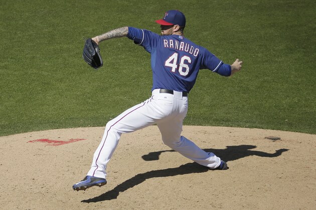 Texas Rangers pitcher Anthony Ranaudo throws during the fourth inning of a spring training baseball game against the San Francisco Giants Friday, March 6, 2015, in Surprise, Ariz. (AP Photo/Charlie Riedel)