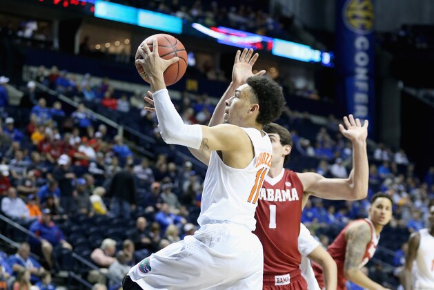 NASHVILLE, TN - MARCH 12:  Chris Chiozza #11 of the Florida Gators shoots the ball against the Alabama Crimson Tide druing the second round game of the SEC Basketball Tournament at Bridgestone Arena on March 12, 2015 in Nashville, Tennessee.  (Photo by Andy Lyons/Getty Images)