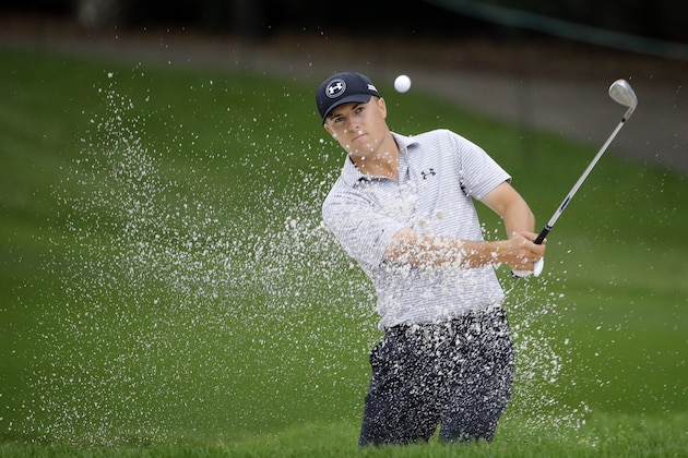 Jordan Spieth hits out of the bunker on the 11th hole during the first round of the Valspar Championship golf tournament Thursday, March 12, 2015, at Innisbrook in Palm Harbor, Fla. (AP Photo/Chris O'Meara)