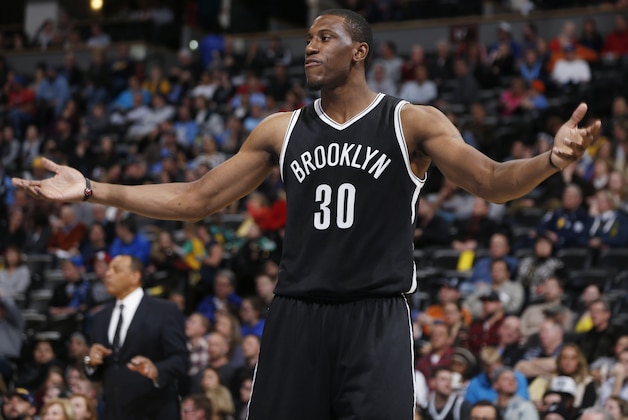 Brooklyn Nets forward Thaddeus Young argues after being called for a foul while facing the Denver Nuggets in the third quarter of an NBA basketball game Monday, Feb. 23, 2015, in Denver. The Nets won 110-82. (AP Photo/David Zalubowski)