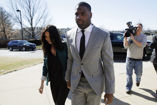 Running back DeMarco Murray arrives with his fiance Heidi Mueller at the Philadelphia Eagles' NFL football practice facility, Thursday, March 12, 2015, in Philadelphia. (AP Photo/Matt Slocum)
