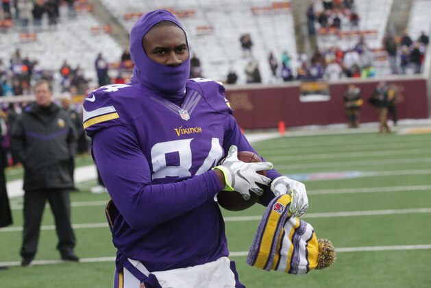 Minnesota Vikings wide receiver Cordarrelle Patterson warms up on the field before an NFL football game against the Chicago Bears, Sunday, Dec. 28, 2014, in Minneapolis. (AP Photo/Jim Mone)