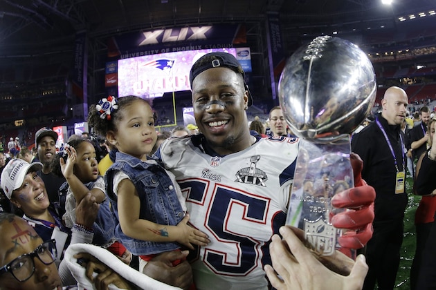New England Patriots middle linebacker Akeem Ayers (55) celebrates after the NFL Super Bowl XLIX football game against the Seattle Seahawks Sunday, Feb. 1, 2015, in Glendale, Ariz. The Patriots won 28-24. (AP Photo/David J. Phillip)