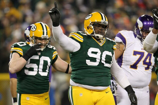 GREEN BAY, WI - JANUARY 05:  Tackle B.J. Raji #90 of the Green Bay Packers reacts after a defensive play in the first half against the Minnesota Vikings during the NFC Wild Card Playoff game at Lambeau Field on January 5, 2013 in Green Bay, Wisconsin.  (Photo by Andy Lyons/Getty Images)