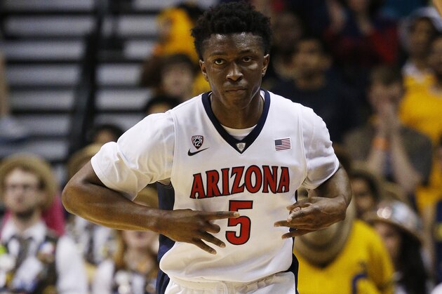 Arizona's Stanley Johnson celebrate after scoring a 3-point shot against California in the first half of an NCAA college basketball game in in the quarterfinals of the Pac-12 conference tournament Thursday, March 12, 2015, in Las Vegas. (AP Photo/John Locher)