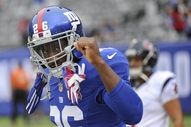 New York Giants strong safety Antrel Rolle (26) motions to fans before playing against the Houston Texans in an NFL football game, Sunday, Sept. 21, 2014, in East Rutherford, N.J. (AP Photo/Bill Kostroun)