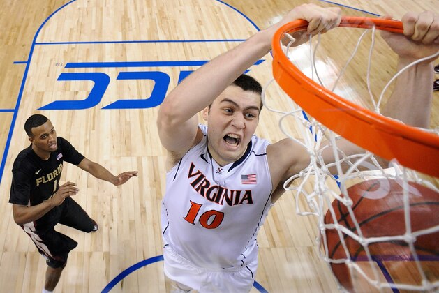 GREENSBORO, NC - MARCH 12:  Mike Tobey #10 of the Virginia Cavaliers dunks against the Florida State Seminoles during the quarterfinals of the ACC Basketball Tournament at Greensboro Coliseum on March 12, 2015 in Greensboro, North Carolina.  (Photo by Grant Halverson/Getty Images)