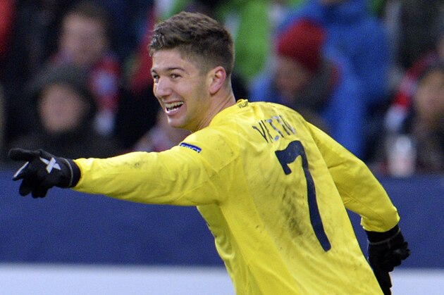 Villareal's Luciano Vietto celebrates after scoring during the Europa League Round 32 soccer match between FC Salzburg and Villareal FC in the Arena in Salzburg, Austria, Thursday, Feb. 26, 2015. (AP Photo/Kerstin Joensson)
