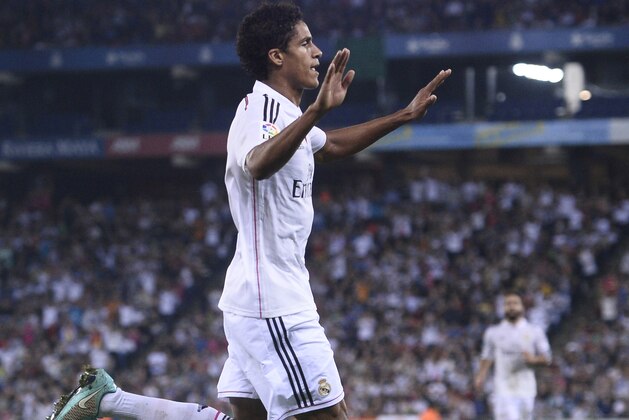 Real Madrid's Raphael Varane reacts after scoring his second goal against Cornella during a Copa del Rey soccer match in Cornella Llobregat, Spain, Wednesday, Oct. 29, 2014. (AP Photo/Manu Fernandez)
