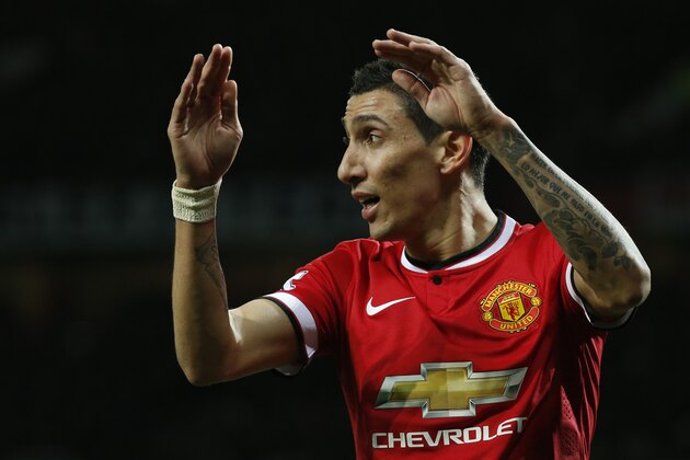 Manchester United’s Angel Di Maria holds his hands to his head after missing a chance to score a goal during the English FA Cup quarterfinal soccer match between Manchester United and Arsenal at Old Trafford Stadium, Manchester, England, Monday March 9, 2015. (AP Photo/Jon Super)