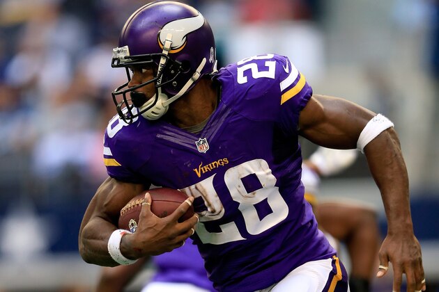ARLINGTON, TX - NOVEMBER 03:  Running back Adrian Peterson #28 of the Minnesota Vikings carries the ball during the game against the Dallas Cowboys at Cowboys Stadium on November 3, 2013 in Arlington, Texas.  (Photo by Jamie Squire/Getty Images)