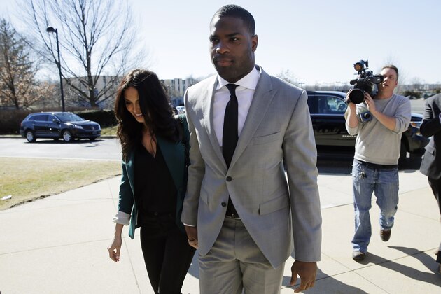 Running back DeMarco Murray arrives with his fiance Heidi Mueller at the Philadelphia Eagles' NFL football practice facility, Thursday, March 12, 2015, in Philadelphia. (AP Photo/Matt Slocum)