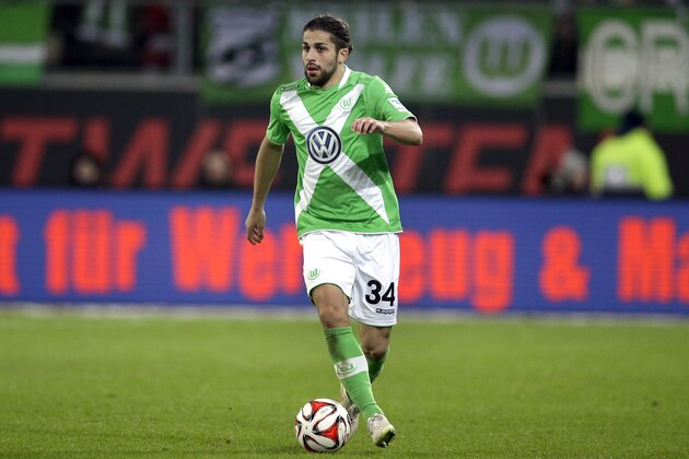 Wolfsburg's Ricardo Rodriguez from Switzerland plays the ball during the German Bundesliga soccer match between VfL Wolfsburg and Hertha BSC at the Volkswagen Arena stadium in Wolfsburg, Germany, Sunday, Feb. 22, 2015. Wolfsburg defeated Berlin by 2-1. (AP Photo/Michael Sohn)