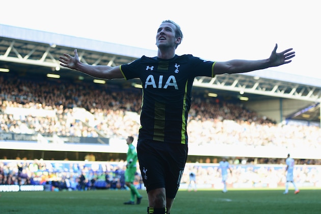 LONDON, ENGLAND - MARCH 07:  Harry Kane of Spurs celebrates as he scores their second goal during the Barclays Premier League match between Queens Park Rangers and Tottenham Hotspur at Loftus Road on March 7, 2015 in London, England.  (Photo by Jamie McDonald/Getty Images)