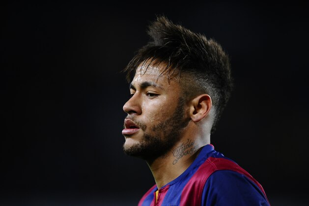 FC Barcelona's Neymar, from Brazil, looks on during a semifinal, first leg, Copa del Rey soccer match between FC Barcelona and Villarreal at the Camp Nou stadium in Barcelona, Spain, Wednesday, Feb. 11, 2015. (AP Photo/Manu Fernandez)