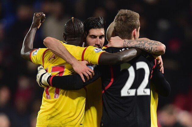 LONDON, ENGLAND - FEBRUARY 14:  Mamadou Sakho, Emre Can and Simon Mignolet of Liverpool celebrate victory after the FA Cup fifth round match between Crystal Palace and Liverpool at Selhurst Park on February 14, 2015 in London, England.  (Photo by Jamie McDonald/Getty Images)