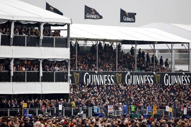 CHELTENHAM, ENGLAND - MARCH 13: A large crowd during Gold Cup day at the Cheltenham Festival at Cheltenham racecourse on March 13, 2015 in Cheltenham, England. (Photo by Alan Crowhurst/Getty Images)