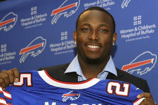 Buffalo Bills running back LeSean McCoy holds his jersey after a news conference in Orchard Park, N.Y., Tuesday, March 10, 2015. McCoy is guaranteed to make $26.5 million, including $16 million this season. (AP Photo/Gary Wiepert)