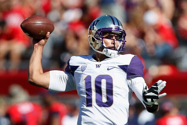 TUCSON, AZ - NOVEMBER 15:  Quarterback Cyler Miles #10 of the Washington Huskies warms up before the college football game against the Arizona Wildcats at Arizona Stadium on November 15, 2014 in Tucson, Arizona.  (Photo by Christian Petersen/Getty Images)