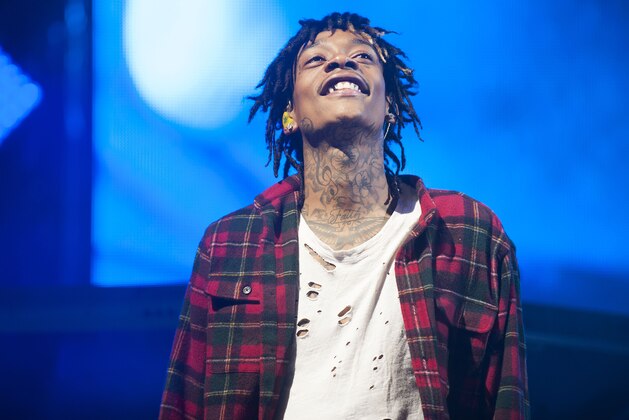 Wiz Khalifa performs on stage at the Molson Amphitheatre during the